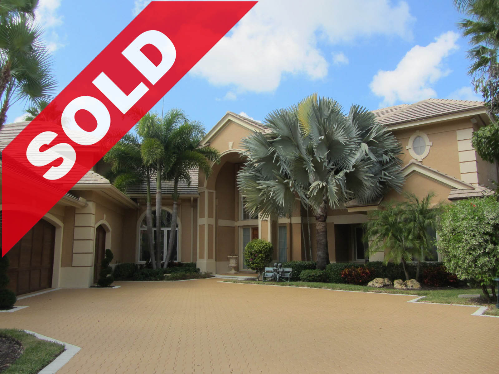 SOLD - Spectacular custom built Jonathan's Landing Casseeky Island estate home with surrounding waterways, astounding scenic views and direct Intracoastal access!