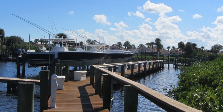 Bay Head is a real estate community within Jonathan's Landing in Jupiter, Florida offering stunning waterfront single family homes