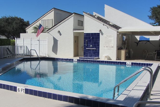 Greens Cay is a real estate community within Jonathan's Landing offering single family townhomes for sale